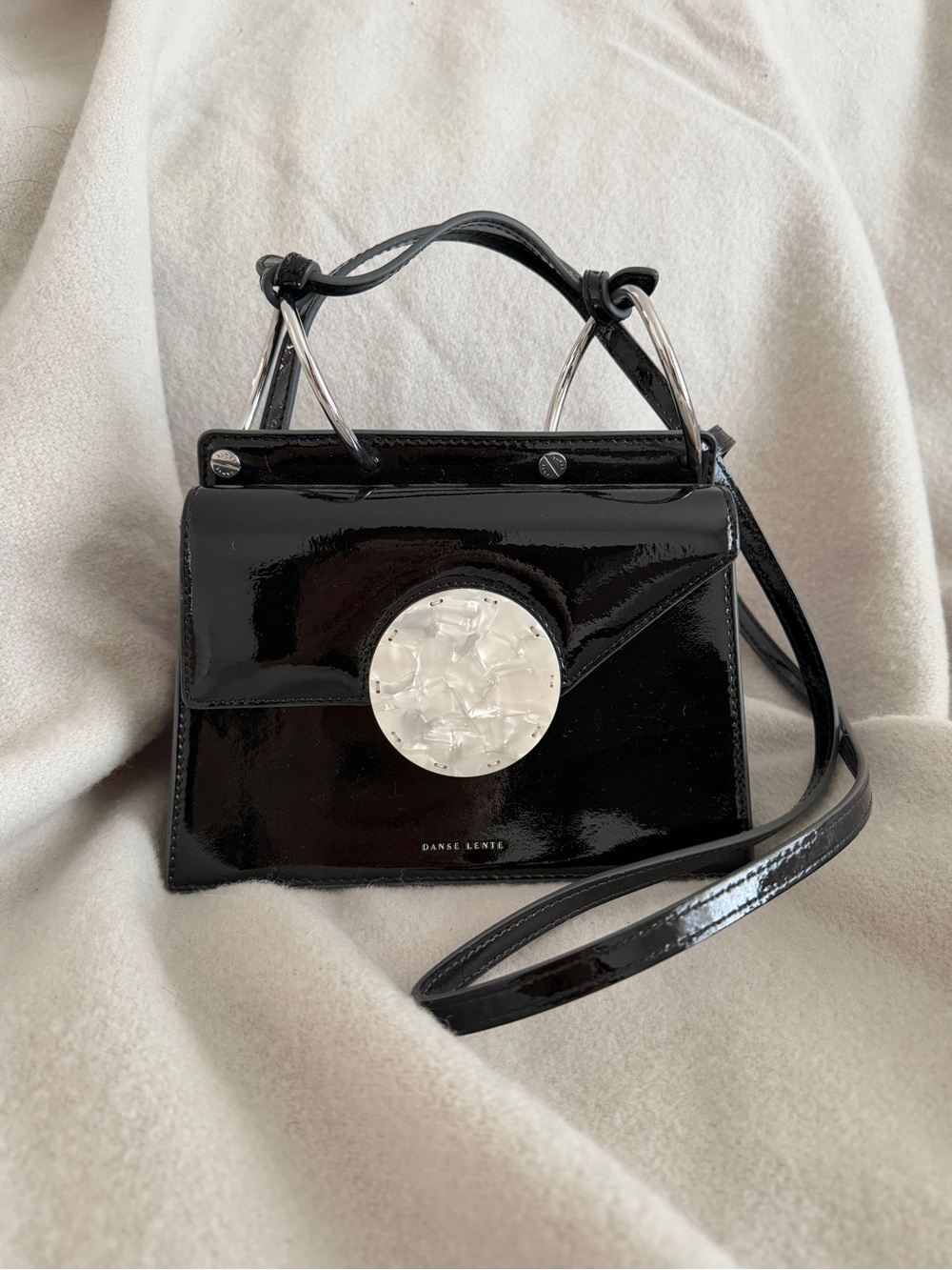 Danse Lente Black Patent Mini Bag with White Resin Accent